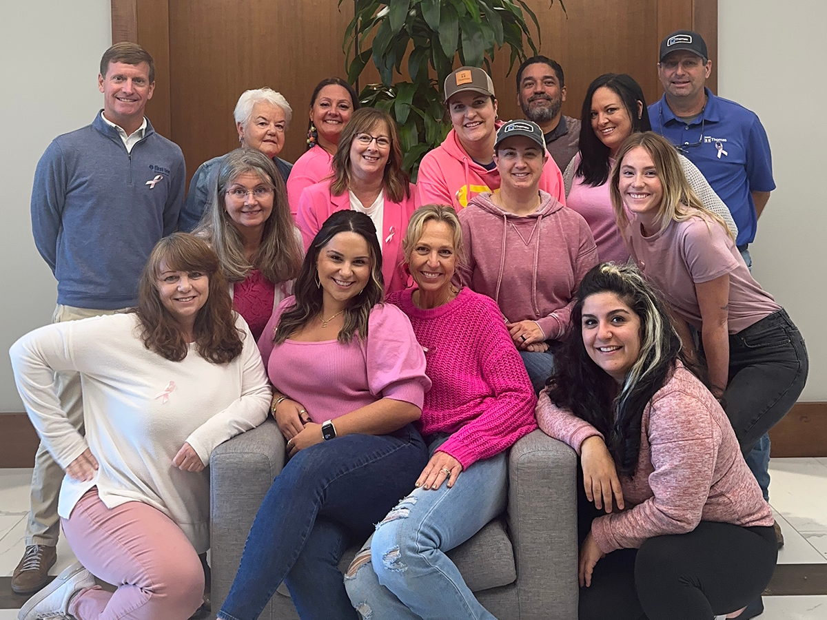 Group of Thomas employees in pink for Breast Cancer Awareness Day