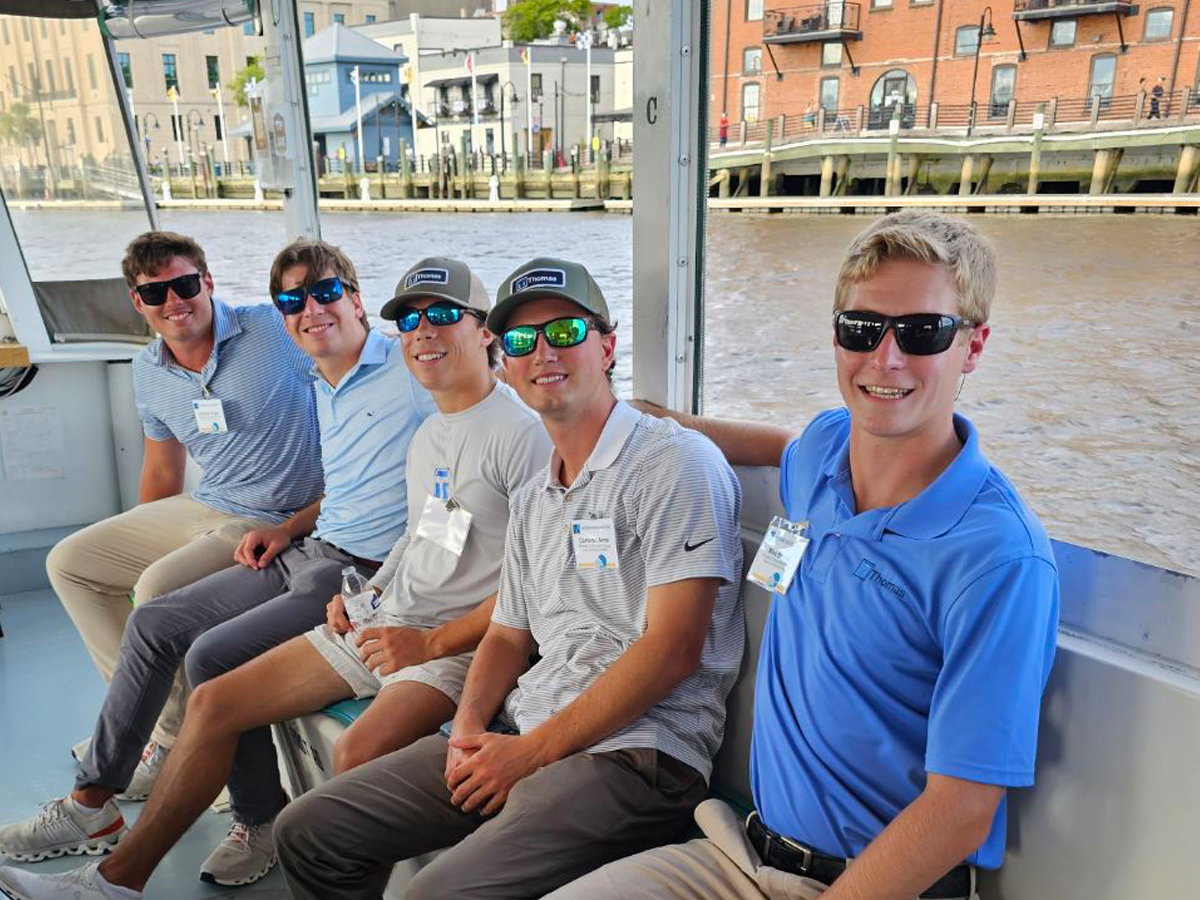 Interns on a boat ride on the river in downtown Wilmington